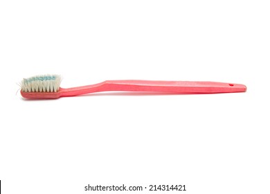 Old Toothbrush Isolated On White Background