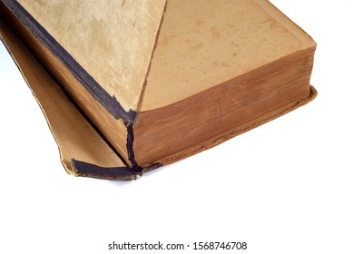 
Old Torn Book Requiring Repair On A White Background