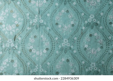 Old torn wallpaper on the wall.Old wallpaper for texture or background. - Shutterstock ID 2284936309