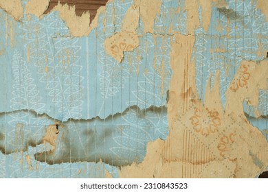 Old torn wallpaper on the wall.Old wallpaper for texture or background. - Shutterstock ID 2310843523