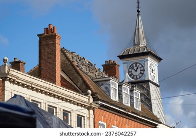 Old tower with clock face                              