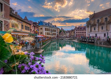 Old town of Annecy with river Thiou, medieval palace the Palais de l'Isle, Annecy, France on July 22, 2022.