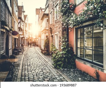Old town in Europe at sunset with retro vintage Instagram style filter effect - Shutterstock ID 193689887