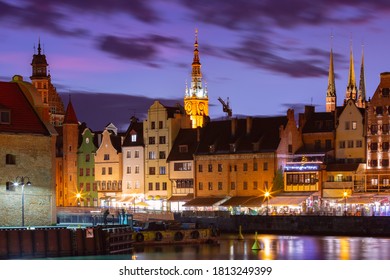 Old Town of Gdansk, Dlugie Pobrzeze, Bazylika Mariacka or St Mary Church, City hall and Motlawa River at night, Poland - Shutterstock ID 1813249399