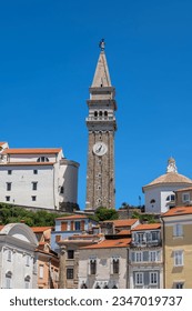 Old Town of Piran in Slovenia, St George Church Bell Tower on a hill.