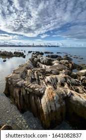 Old Town Of Porec In Istria View From North In Winter Day With Low Sea Level And Formation Of Sea Shaped Stones In Front