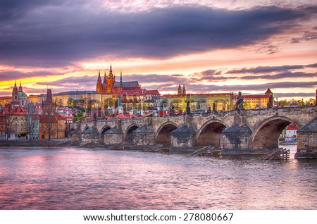 Old Town of Prague (Czech Republic) in sunset. Skyline with Charles (Karluv) Bridge and Vltava River. Castle (Hrad) of Prague in the background. Picture represents main landmarks of spectacular city.