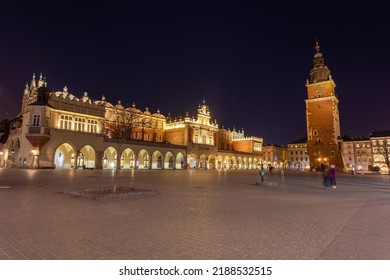 Old Town Square In Krakow At Night, Poland. St. Marys Basilica. Travel