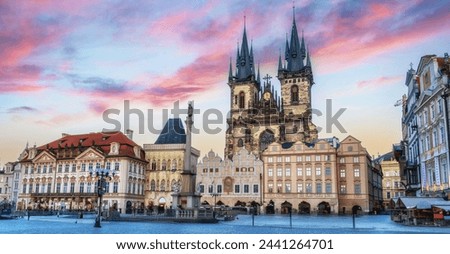 The old town square of Prague, Czech Republic, without people surounded by the historical, gothic style buildings and the famous Tyn Church