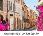 old town street of Aix en Provence at summer day, France