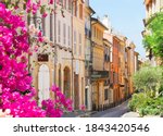 old town street with flowers of Aix en Provence, France