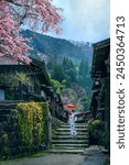 Old town of Tsumago juku in spring. Asian woman wearing japanese traditional kimono at Tsumago juku in Nagano, Japan.