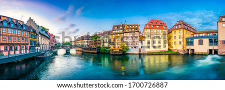 Old town water canal panorama of Strasbourg, Alsace, France. Traditional half timbered houses of Petite France