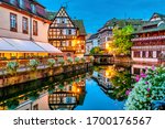 Old town water canal of Strasbourg, Alsace, France. Traditional half timbered houses of Petite France at dawn