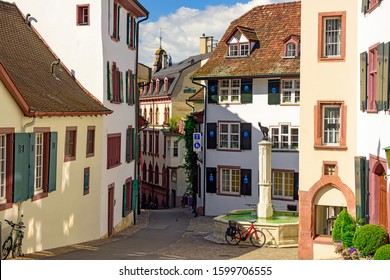 Old Town. Winding Paved Street Surrounded By The Beautiful Medieval Houses On A Sunny Spring Day. Distict Grossbasel, City Of Basel, Switzerland, Europe