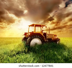 old tractor on the grass field - Powered by Shutterstock