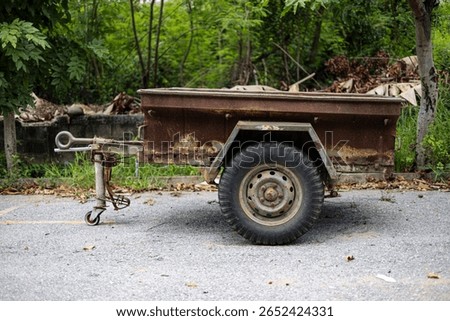 Old Tractor Trailer In The Forest , Background for advertising and wallpaper in decorate and antique car scene.