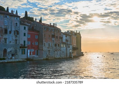 Old tradition colorful Croatian  houses on the shore of Adriatic Sea during sunset. Rovinj, Croatia.