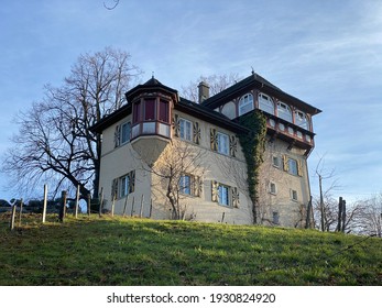 The old traditional Gugger House building on the hill of the Au Peninsula in Lake Zurich (Zürichsee oder Zuerichsee), Wädenswil (Waedenswil) - Canton of Zürich (Zuerich), Switzerland (Schweiz)