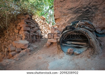Old traditional Moroccan earth ovens made of sandstone and mud with Amazing view of in the Atlas Mountains of Morocco.