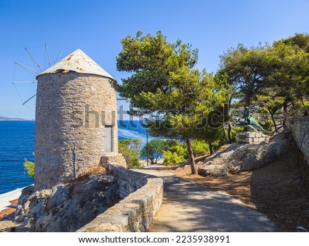 The old traditional windmill, found at the pathway leading from the port of Hydra to Kaminia in Hydra, Greece