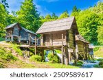 Old traditional wooden mills Mlincici near Jajce on Plivsko Lake, Bosnia and Herzegovina