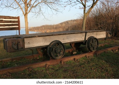 An Old Train Car Over The Railway In The Museum