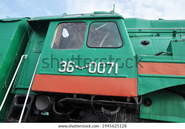 Old\
train and driver\'s cab. Fragment of the driver\'s\
cab