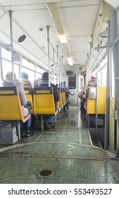 Old Tram Interior With People In The City     