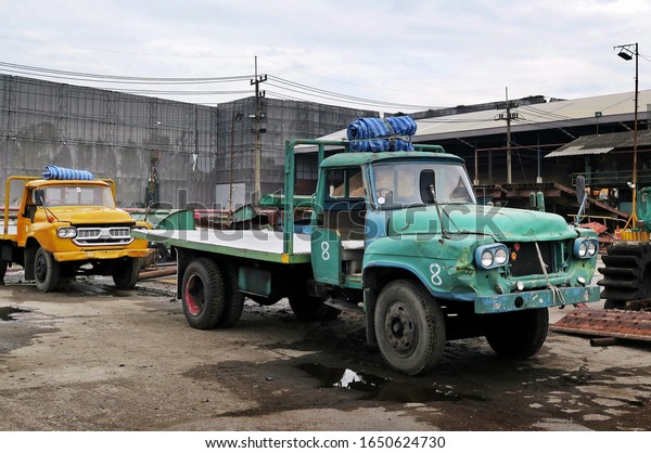 Old truck in the car\
repair factory