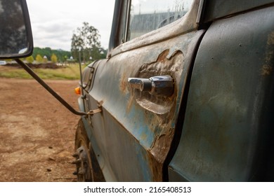 Old Truck Detail In Rural Area. Featured Rusty Door Handle