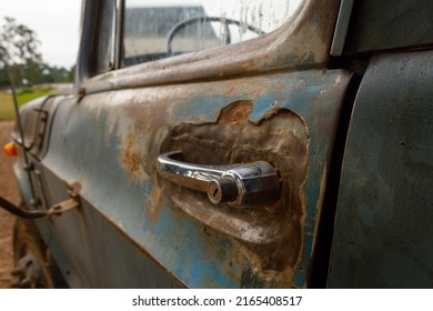 Old Truck Detail In Rural Area. Featured Rusty Door Handle