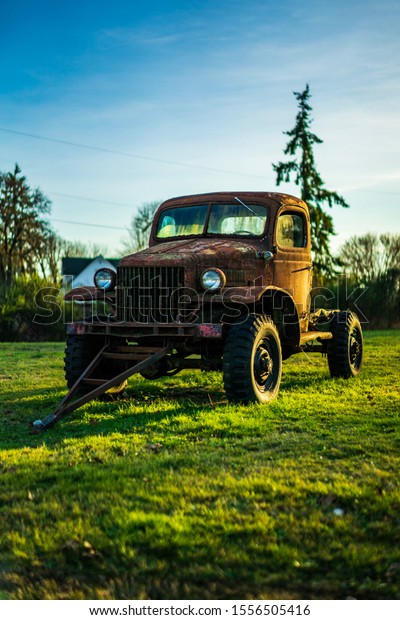 An old truck on display on a sunny day in\
thurston county Washington on June 23\
2019