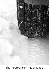 Old Truck Tire In Fresh Snow Rugged Tread