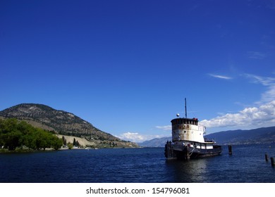 Old Tug Boat Moored On Lake Okanagan, Penticton, British Columbia, Canada.. 