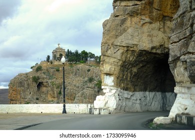 Old tunnel along le Boulevard de l'Abime located in the medina of Constantine, Algeria in autumn season with the background of Monument aux Morts (Monument to the Fallen) in Constantine, Algeria.