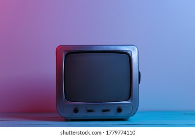 Old Tv Receiver In Red Blue Neon Light. Retro Wave, Media