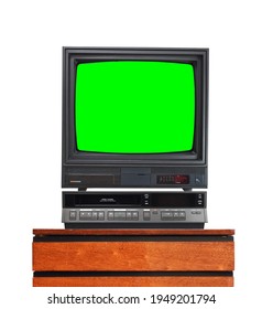 Old TV Set With Cut Out Green Screen And VCR Isolated On White, Stand On Vintage Nightstand 1990s, 1980s.