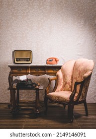 Old tv and telephone in an interior place with decoration in retro style. - Shutterstock ID 2149146091