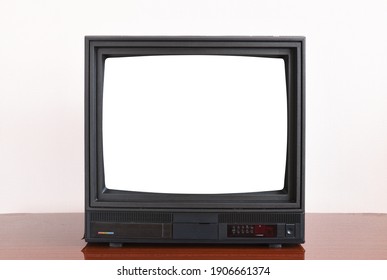 Old TV With White Screen On An Old Table, Vintage Design In An 80s And 90s Style House.