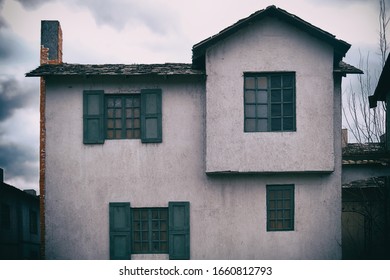 An Old Two Story House With A Chimney In The Style Of Retro American Buildings Of The Wild West