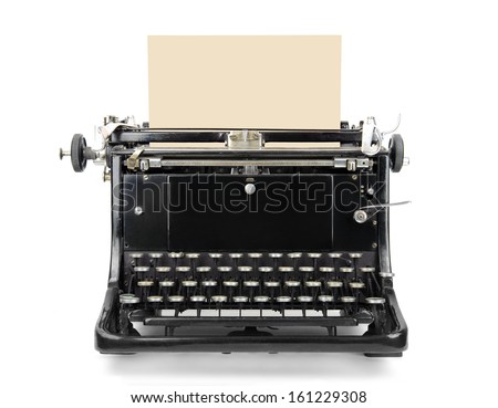 Old typewriter with blank sheet isolated on white