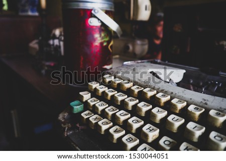 Old typewriter or keyboard used for vintage style cafe interior.