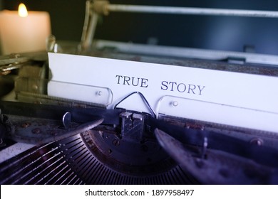 old typewriter on table, words true story are printed on paper in large size, retro style, concept of writer, journalist, private detective