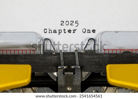 old typewriter with text 2025 chapter one	