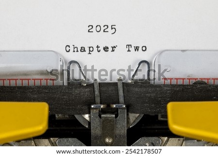 old typewriter with text 2025 chapter two	