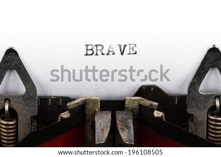 Old typewriter with text brave