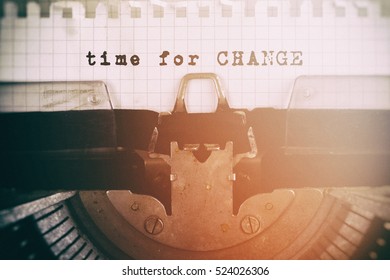 Old typewriter with text TIME FOR CHANGE. Vintage Filter.