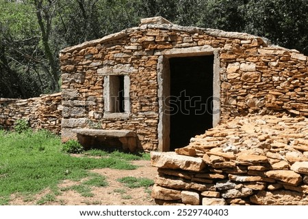 Old and typical stone hut called caborne in French language in Saint Cyr au Mont d'or, France	