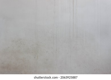 Old Ugly Wall Covered With Cement. Texture With Beautiful Dirt Streaks And Spots Of Dirt
